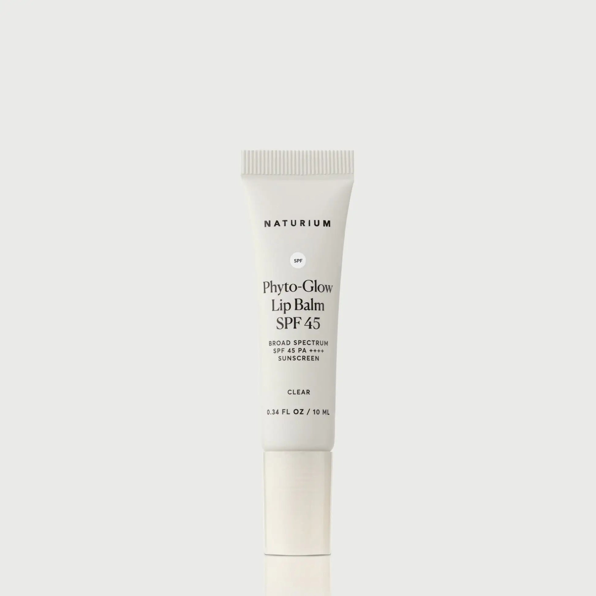 phyto-glow-lip-balm-spf-45-clear-e9 NATR-10124_PhytoGlow_SPF_Clear_primary_capon_front_bonebkgd_1.webp